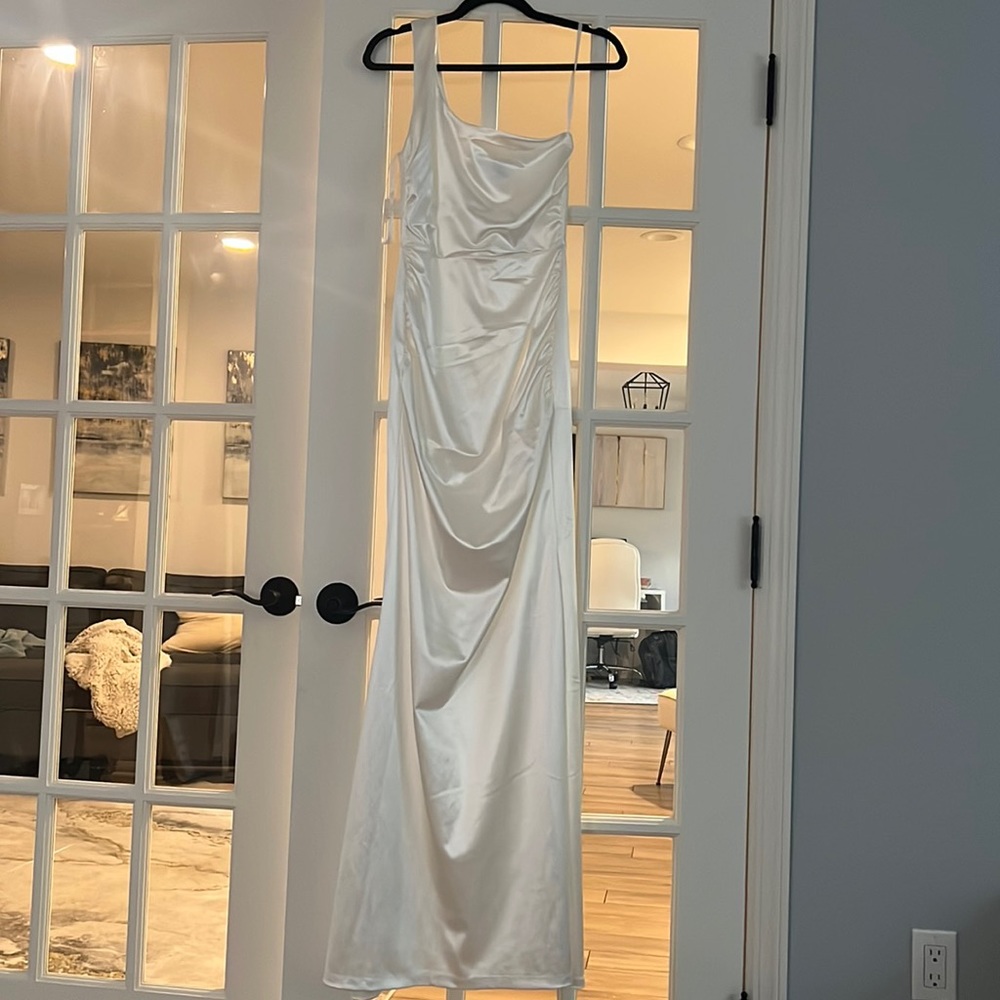 Brand new fitted white satin gown with tags.
